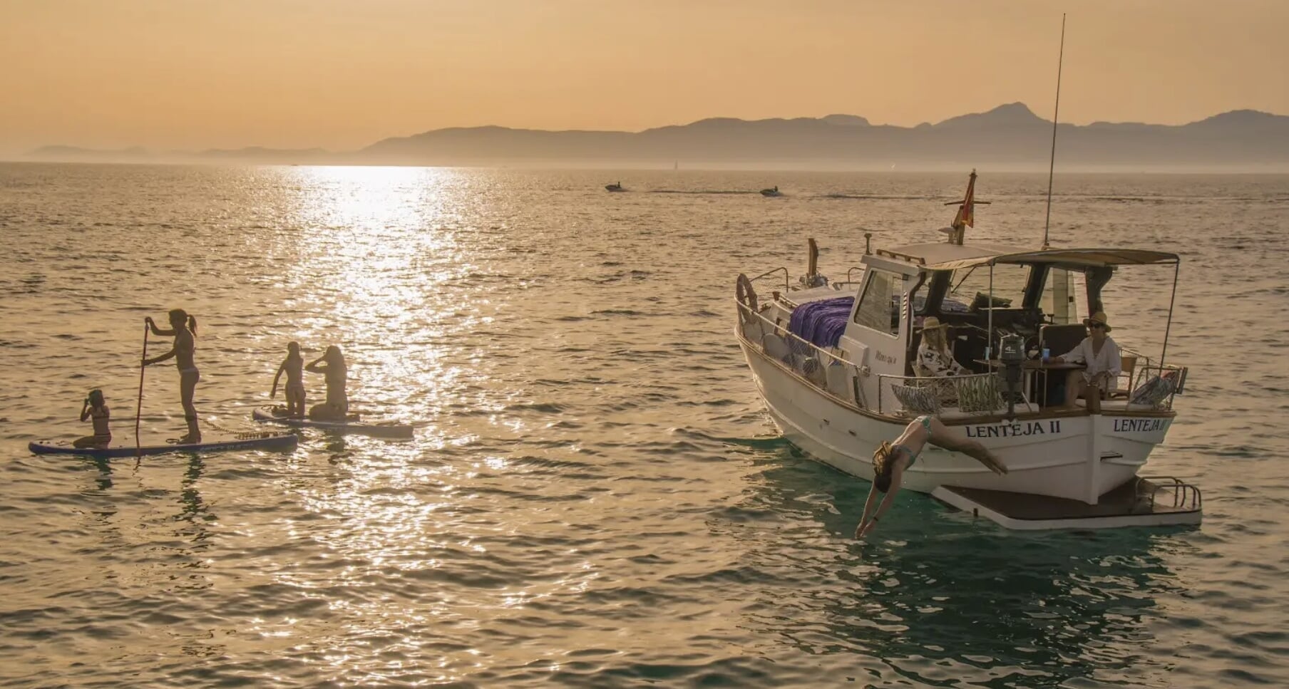 paddling during boat trip in puerto pollensa