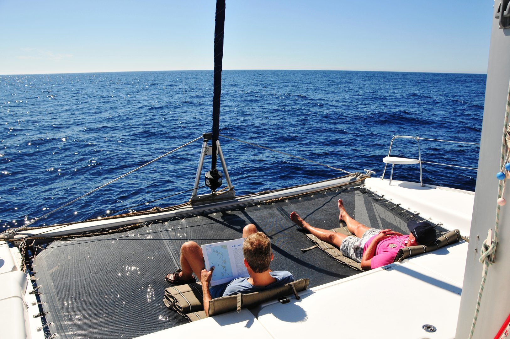 sunbathing on the catamaran